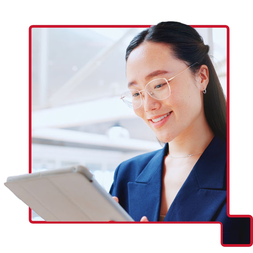 lady reading ipad and smiling